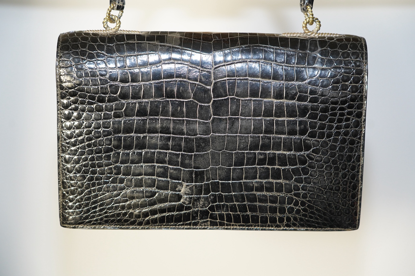 A Hermès vintage Cordeliere black crocodile handbag, height 16.5cm, top of handle 31cm, width 27.5cm, depth 5cm